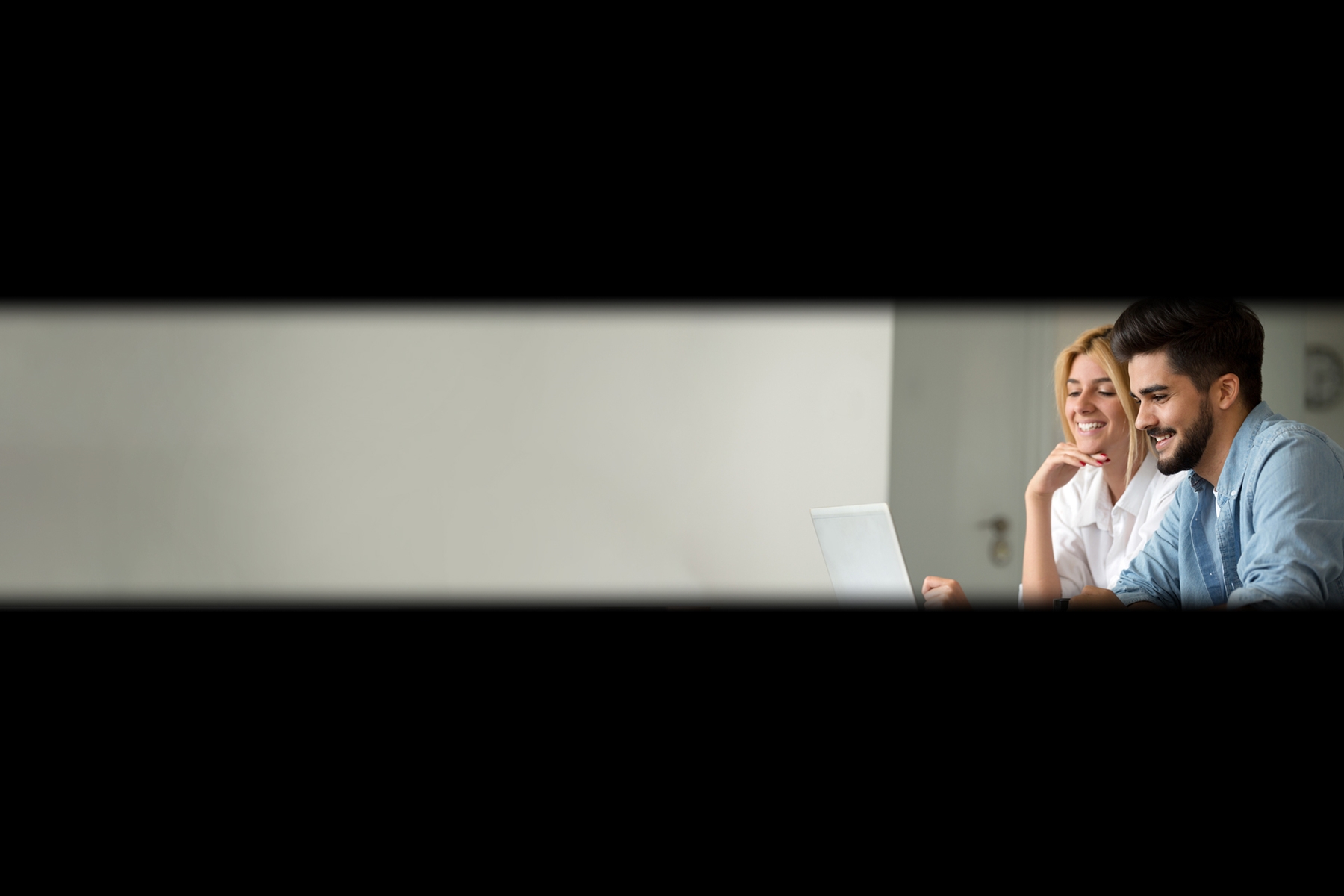 Couple looking at computer